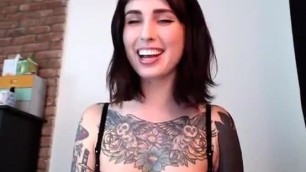 Sexy tattooed brunette - see her strip