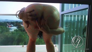 Public exhibitionist ass orgasms on the balcony